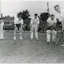 Reg Bradley and Four Unidentified Men Playing Cricket